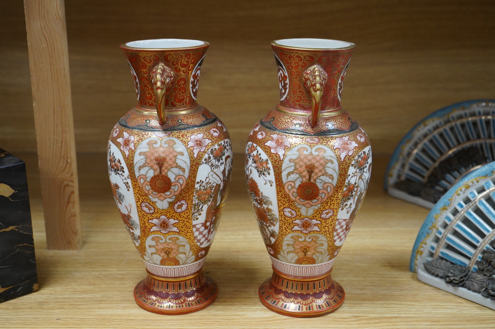 A pair of Japanese Kutani vases, signed, Meiji Period (1868-1912), 29cm